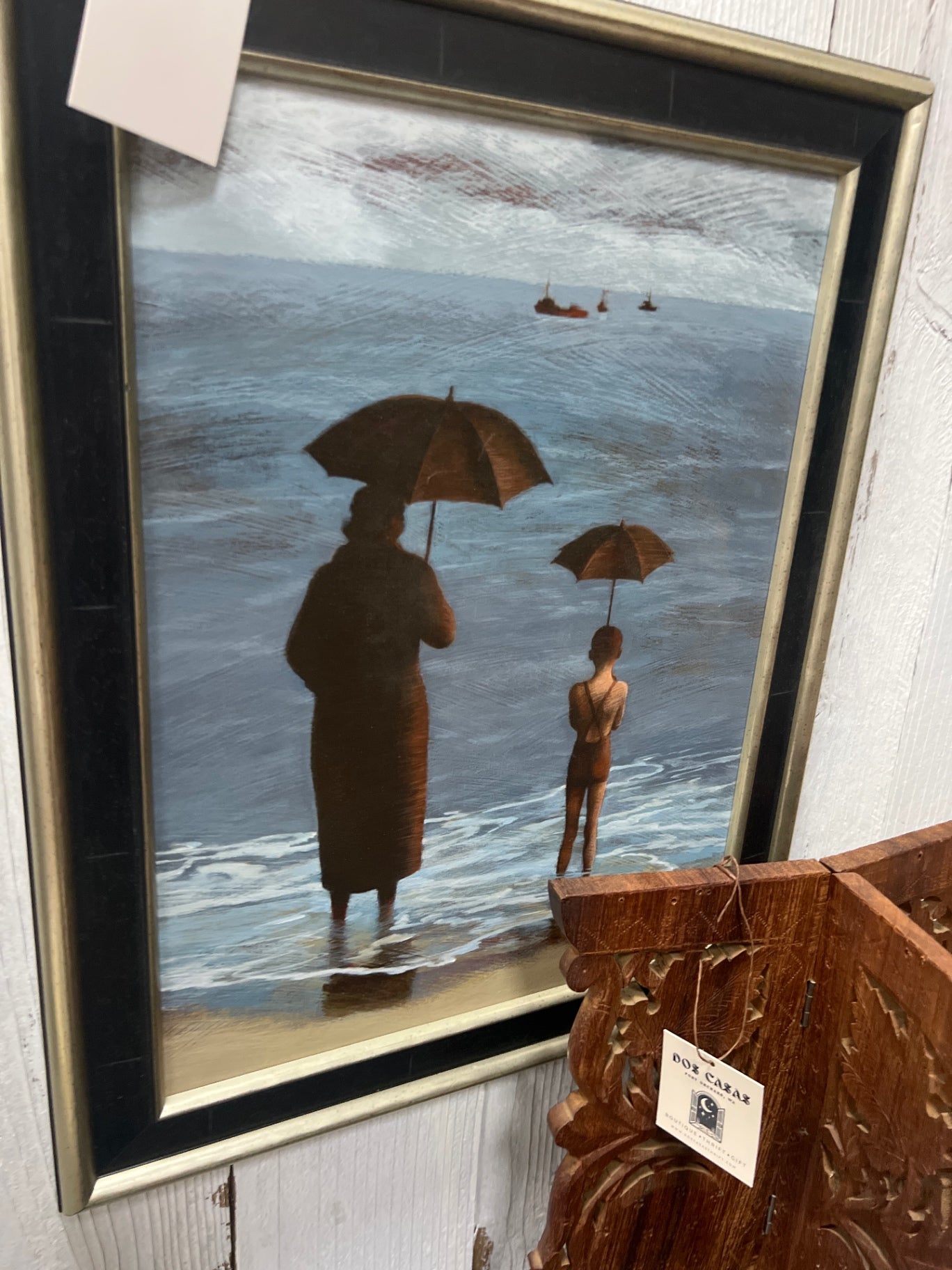 Two people under umbrellas 
