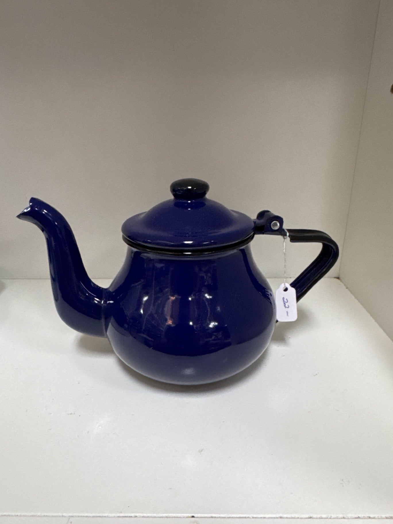 Tiny blue enamelwere teapot