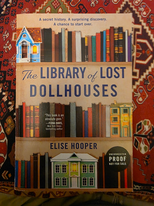 THE LIBRARY OF LOST DOLLHOUSES.