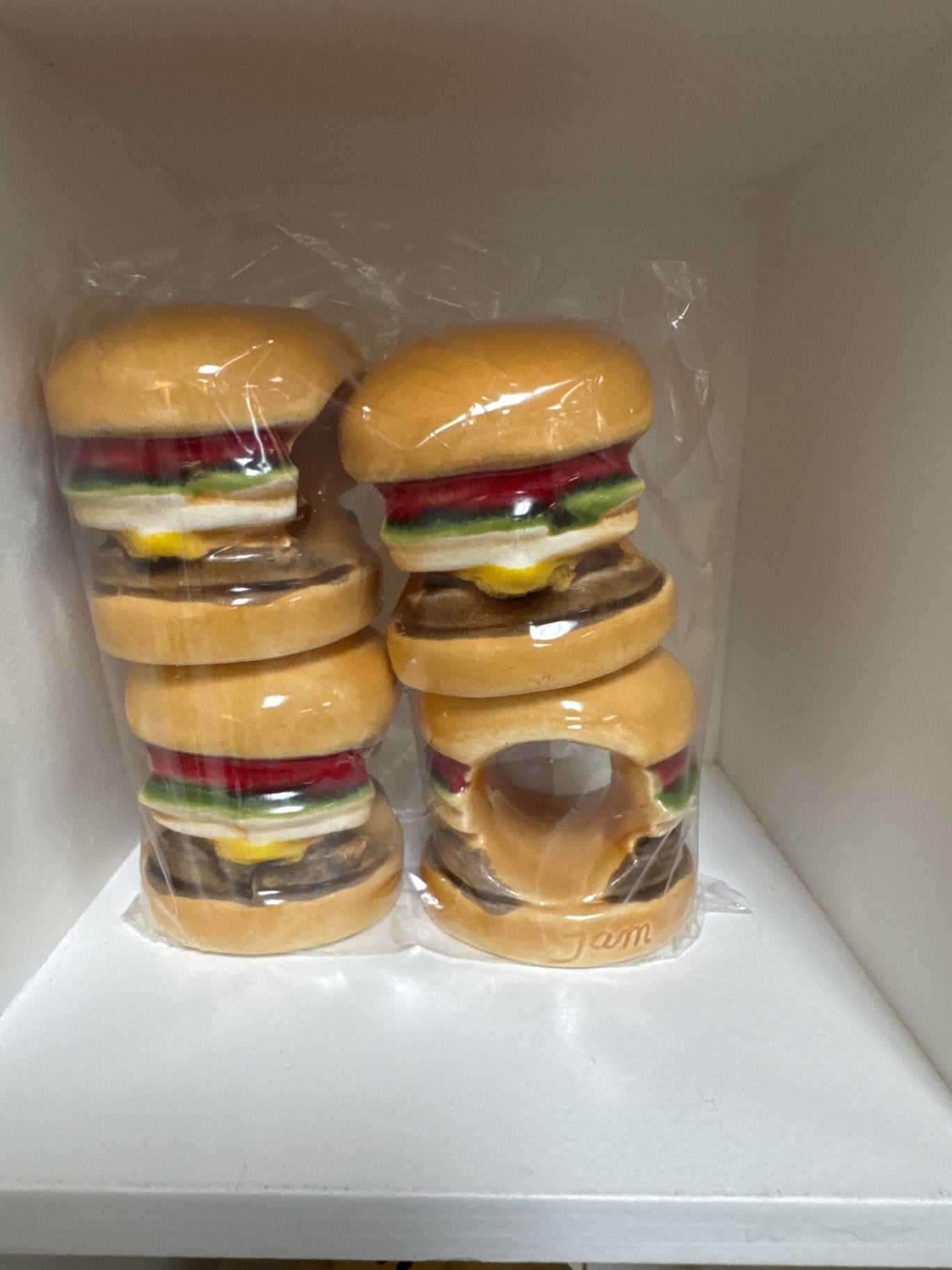 Unique set of four ceramic cheeseburger napkin rings