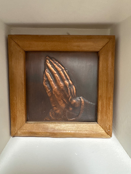 Copper praying hands