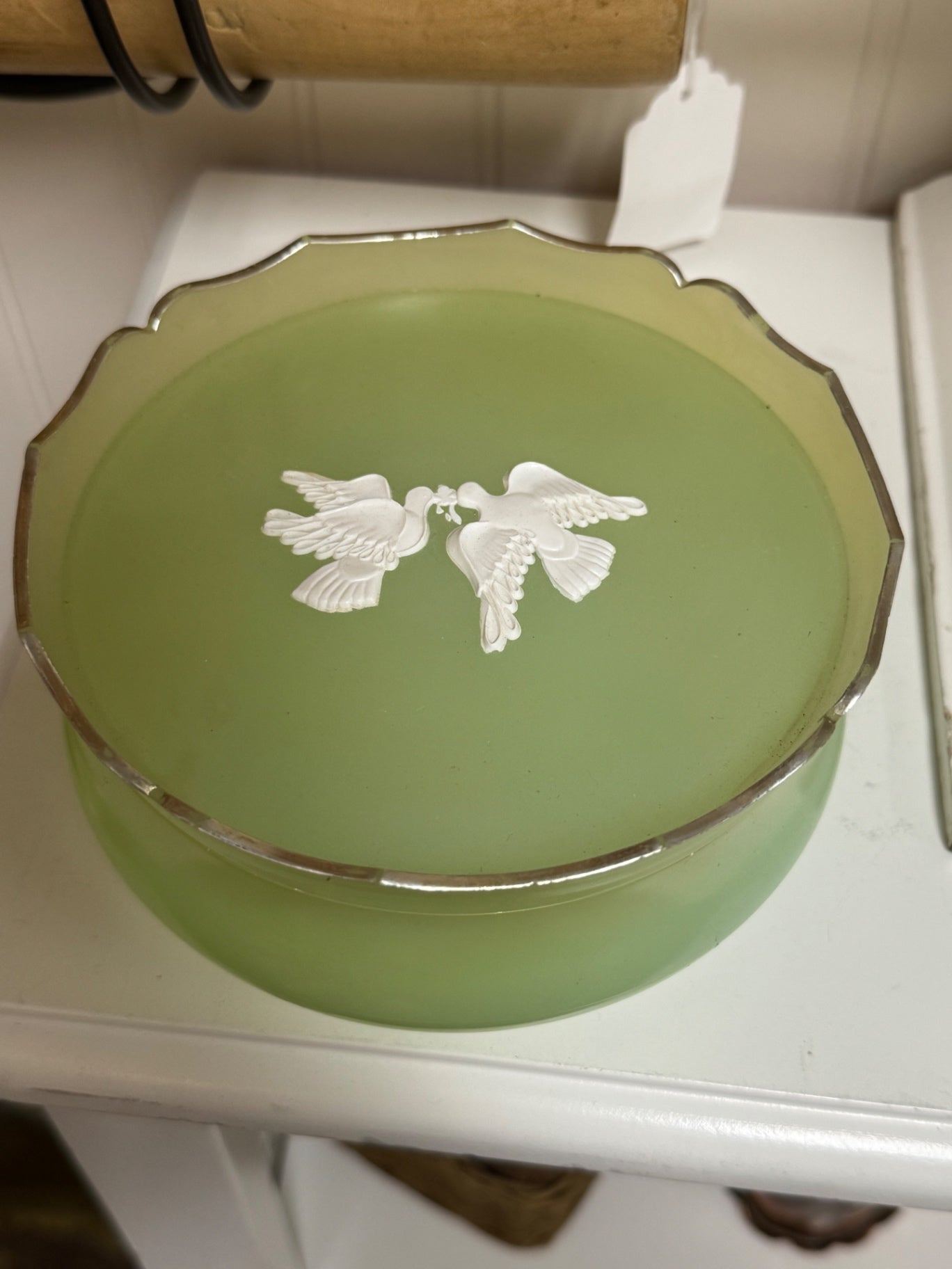 vintage Avon "Rapture" Beauty Dust powder container from the 1960s.