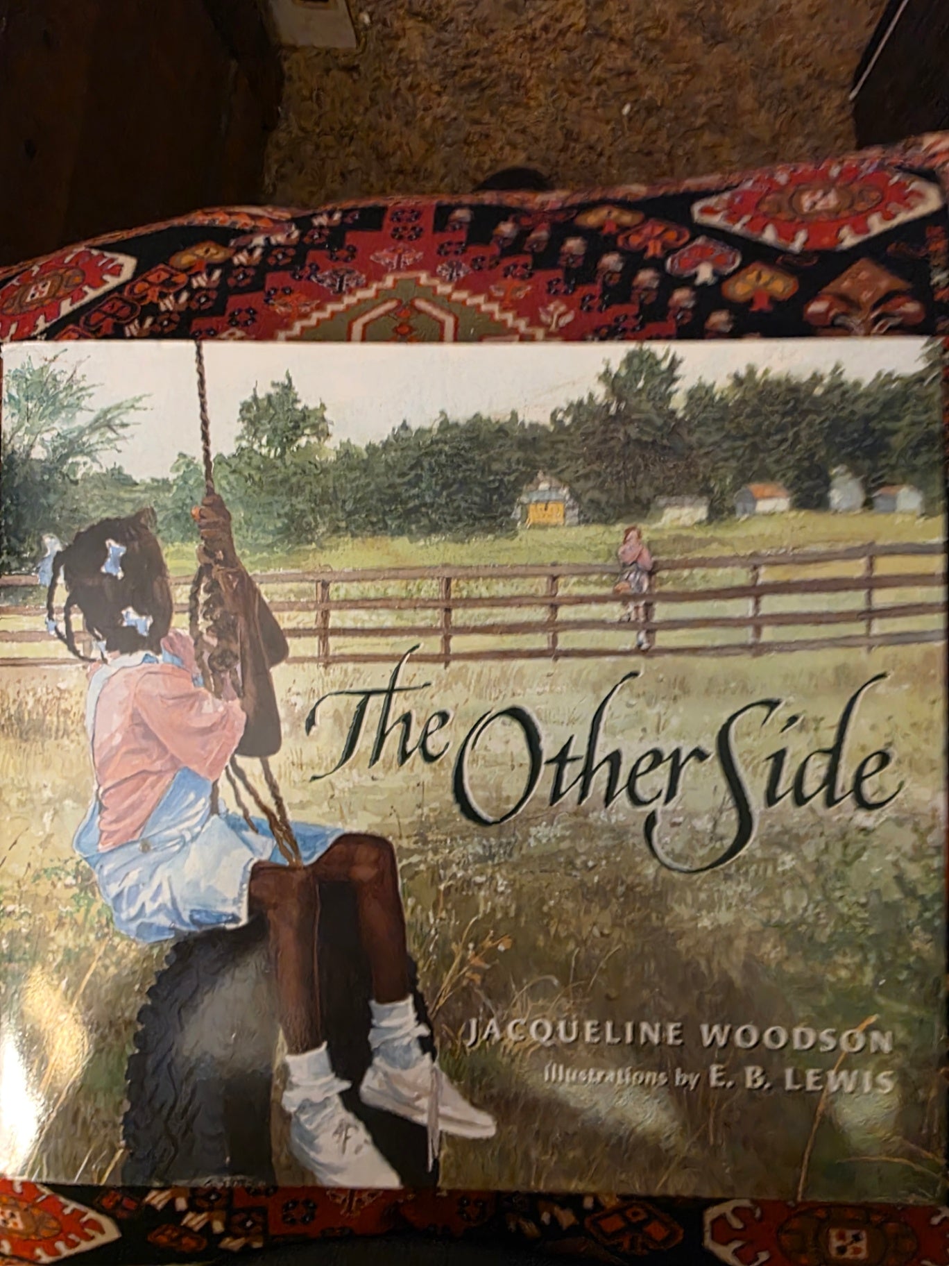 THE OTHER SIDE BY JACQUELINE WOODSON.