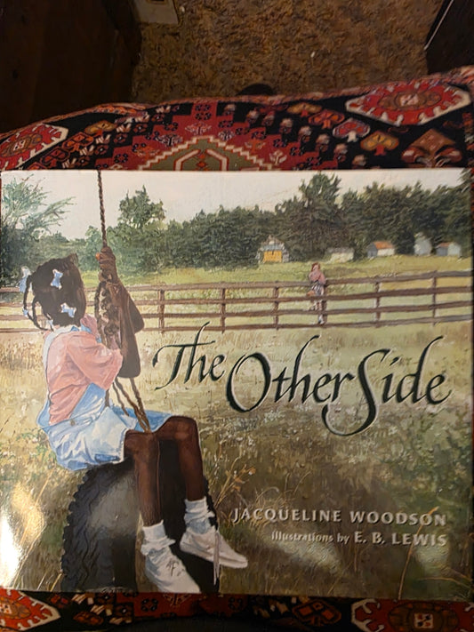 THE OTHER SIDE BY JACQUELINE WOODSON.