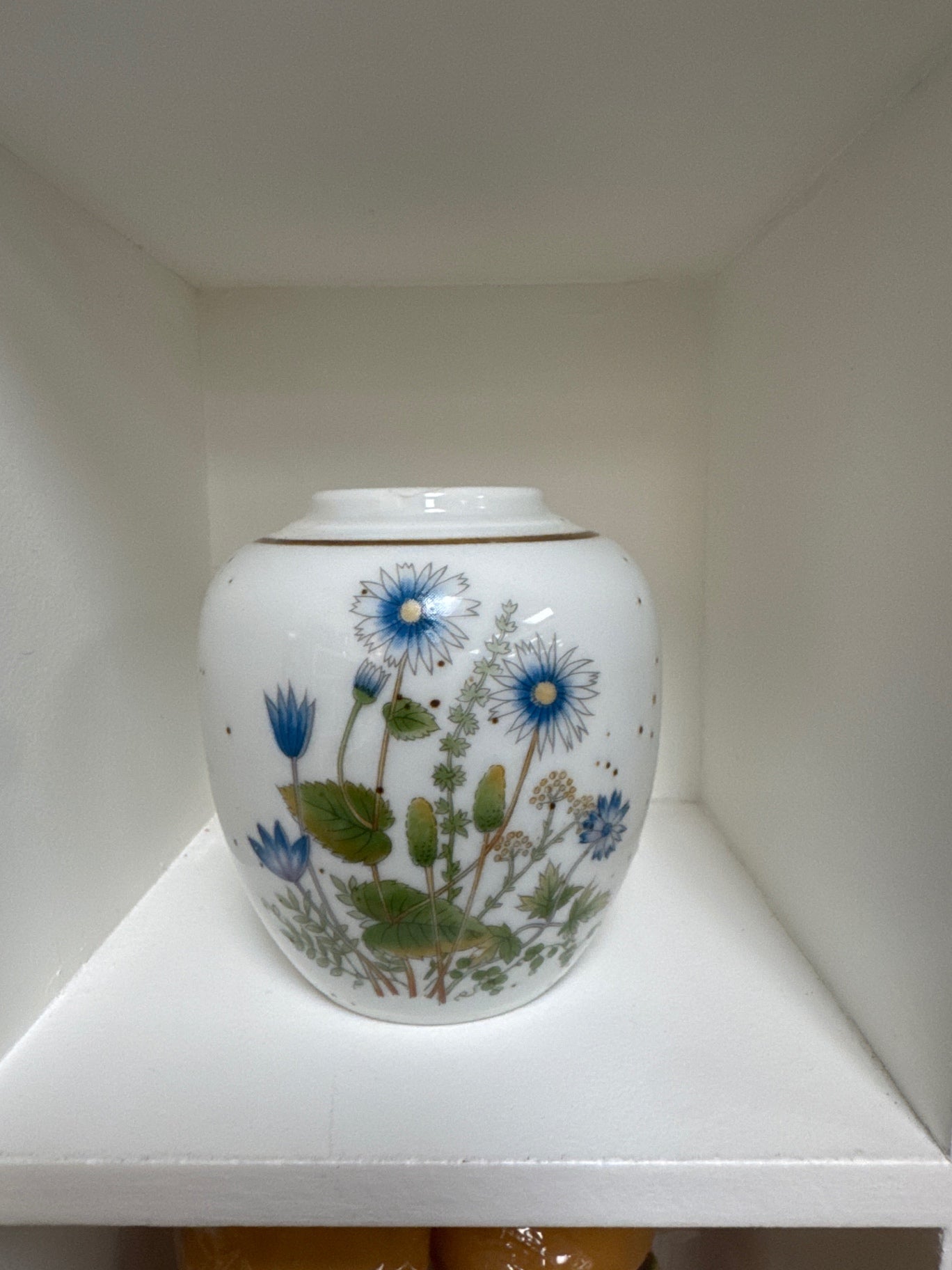 White Japanese vase with blue flowers