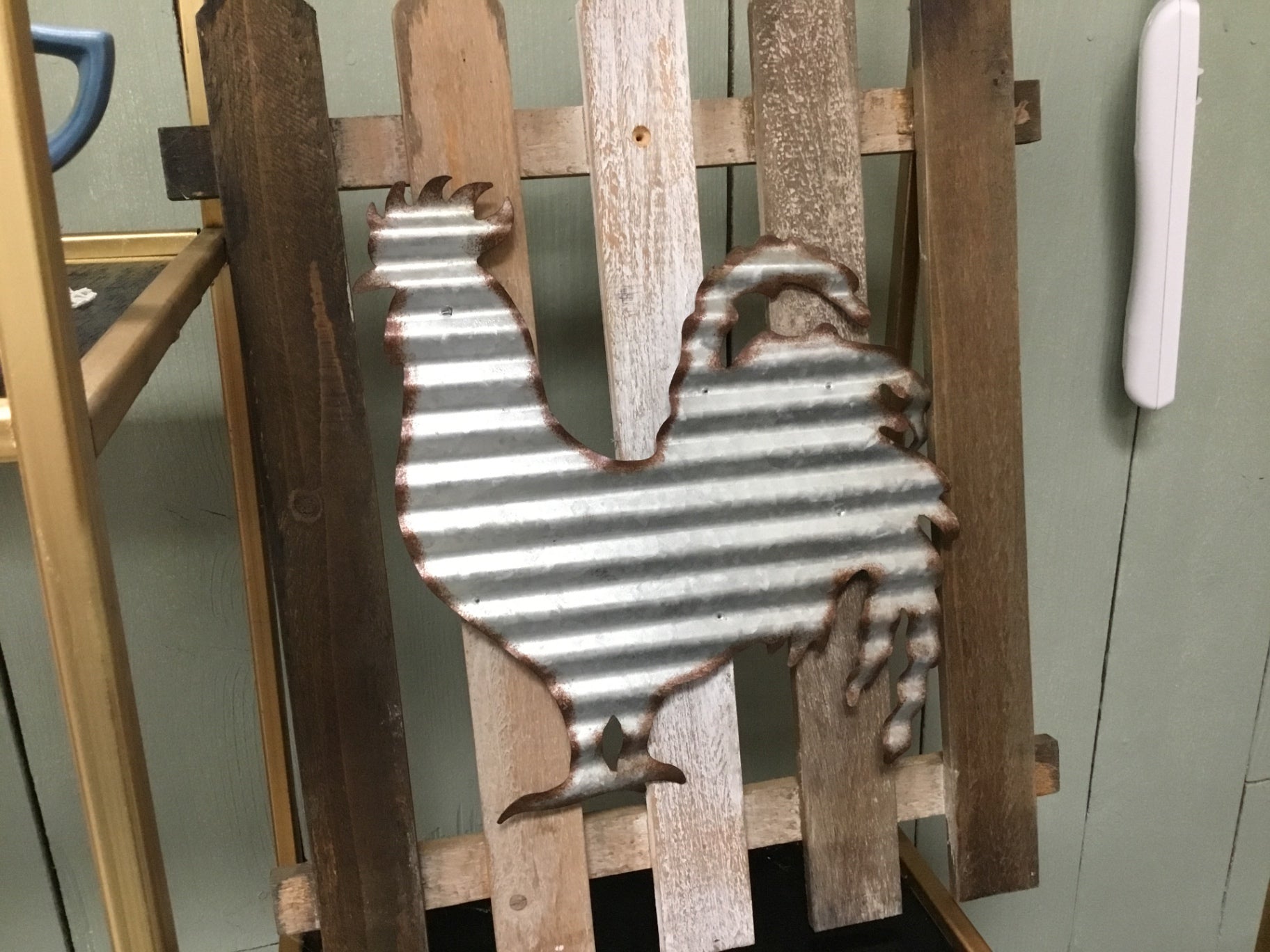Galvanized Rooster  on  board fence