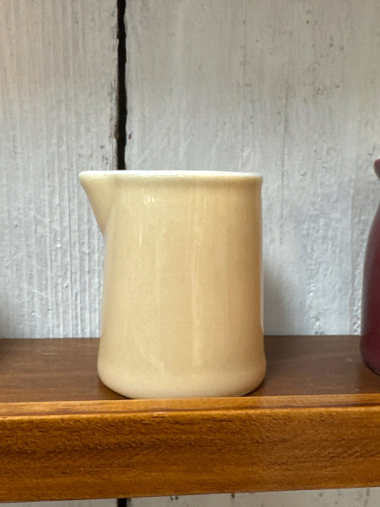 Individual creamer cup