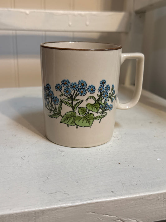 Small mug with blue flowers
