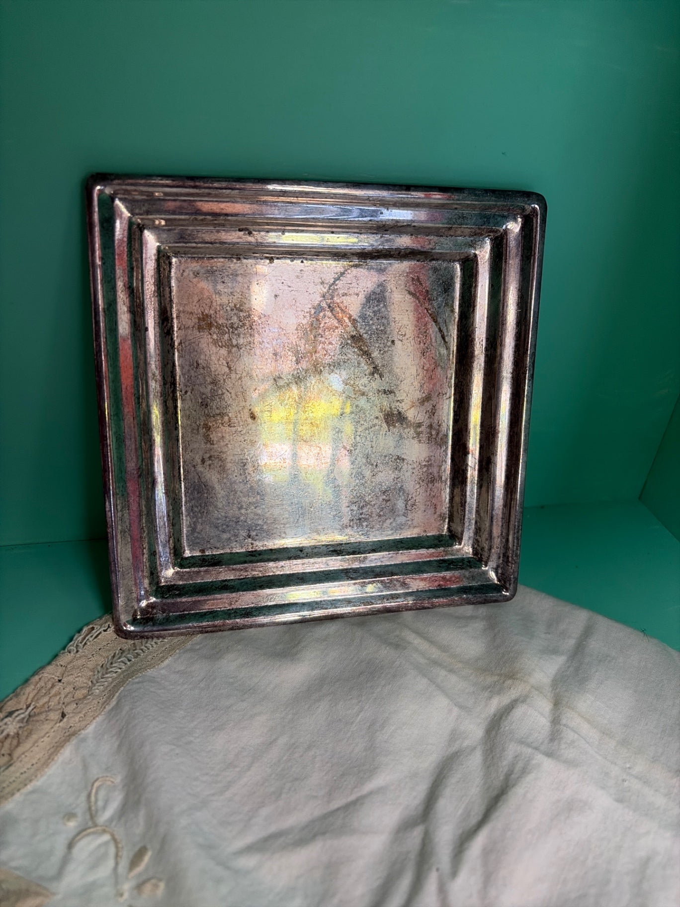 Silver colored trinket candle dish