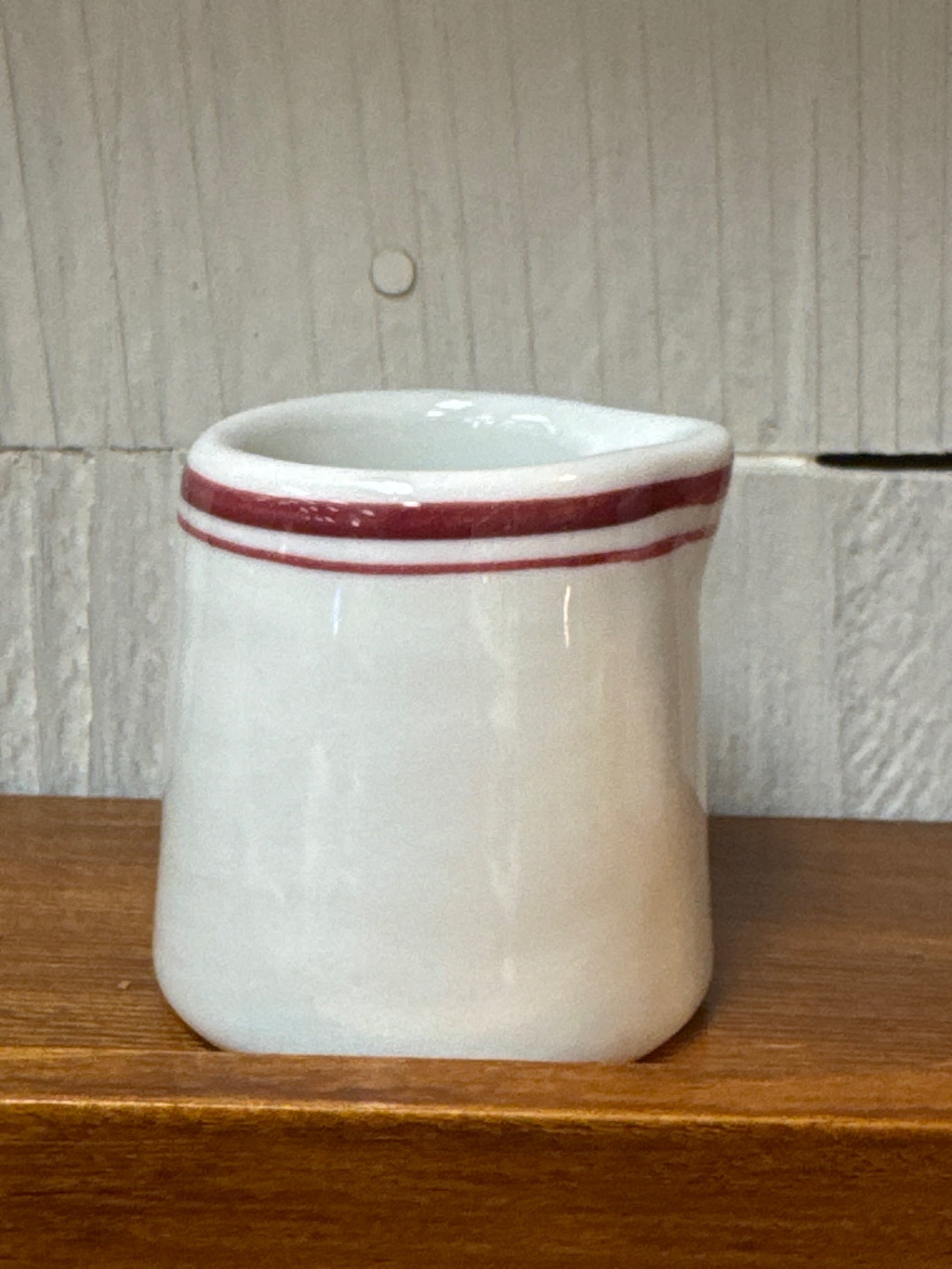 Individual creamer cup
