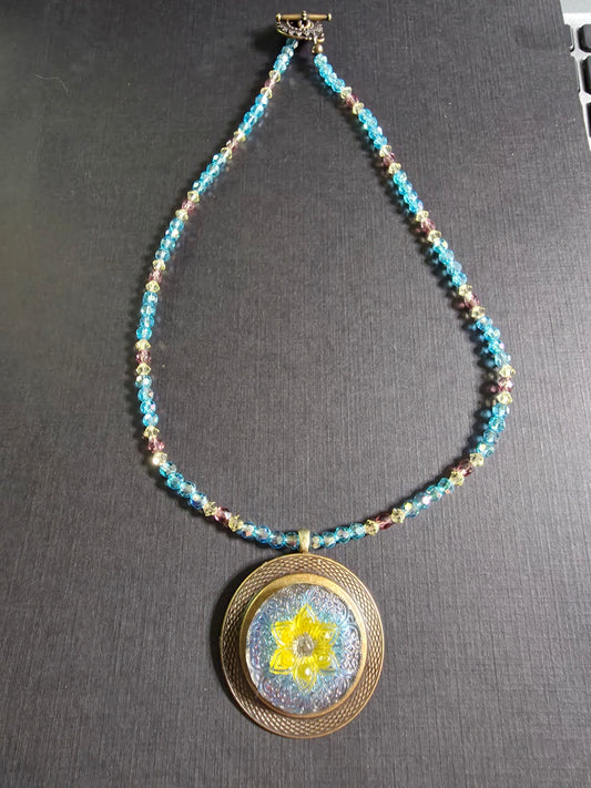 10n yellow blue button w/cyrstal beads