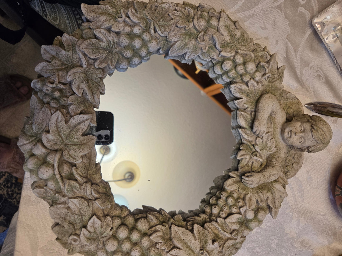 Grasslands cherub mirror
