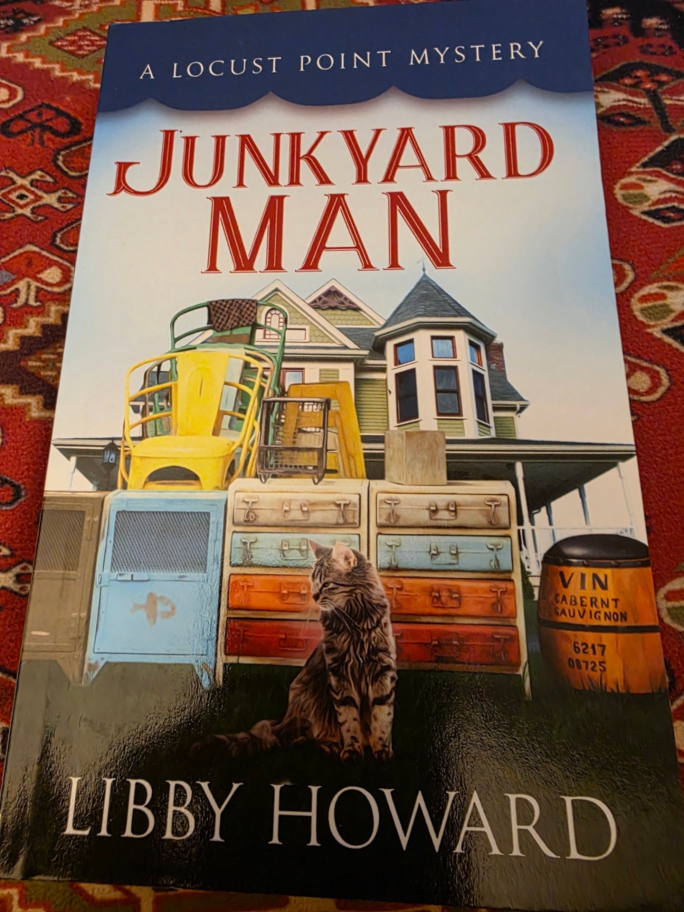 JUNKYARD MAN, BY LIBBY HOWARD.