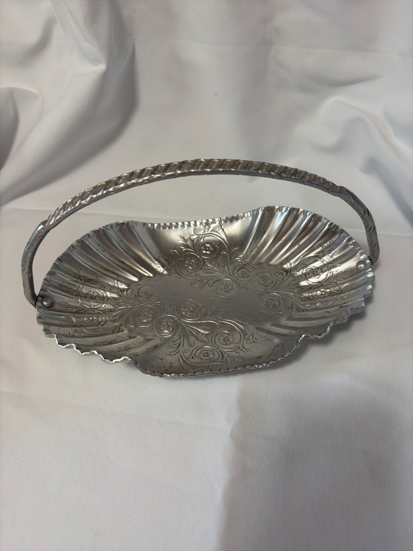 Floral themed aluminum basket 