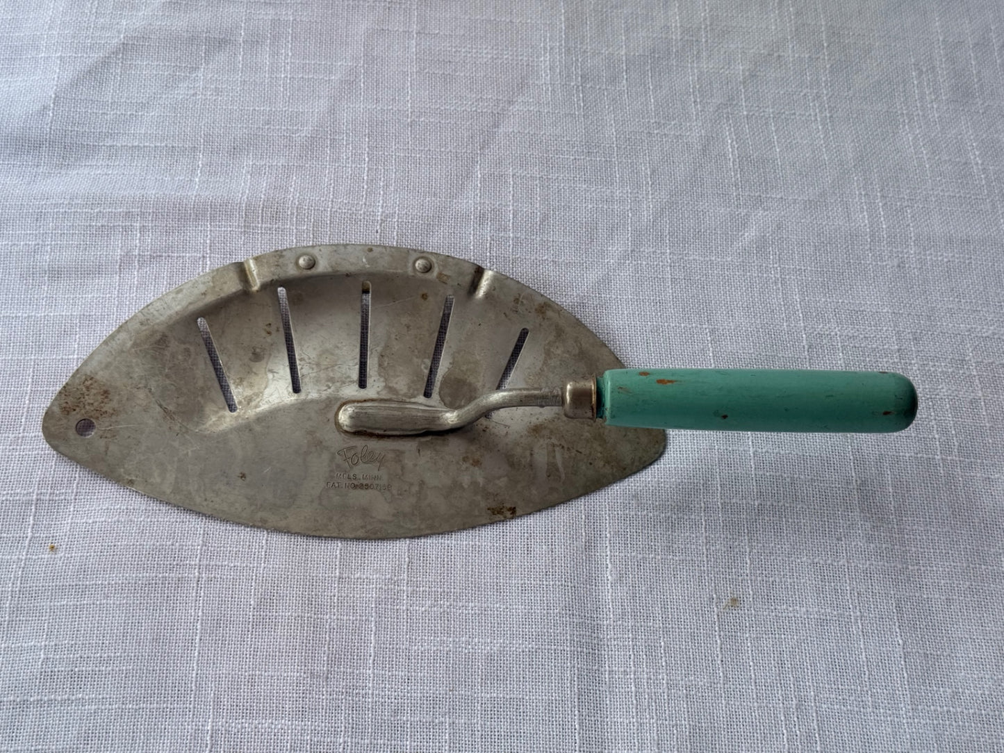 Vintage Foley Pot Strainer with Green Wooden Handle - Pat. No. 2567188