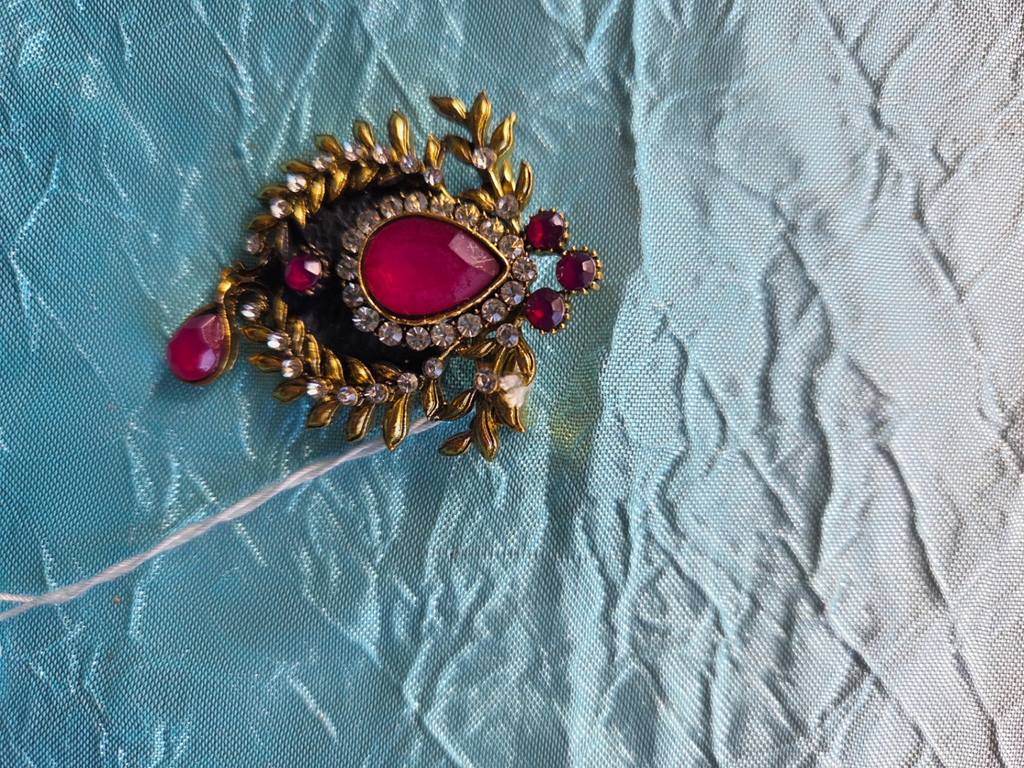 Red gold pin