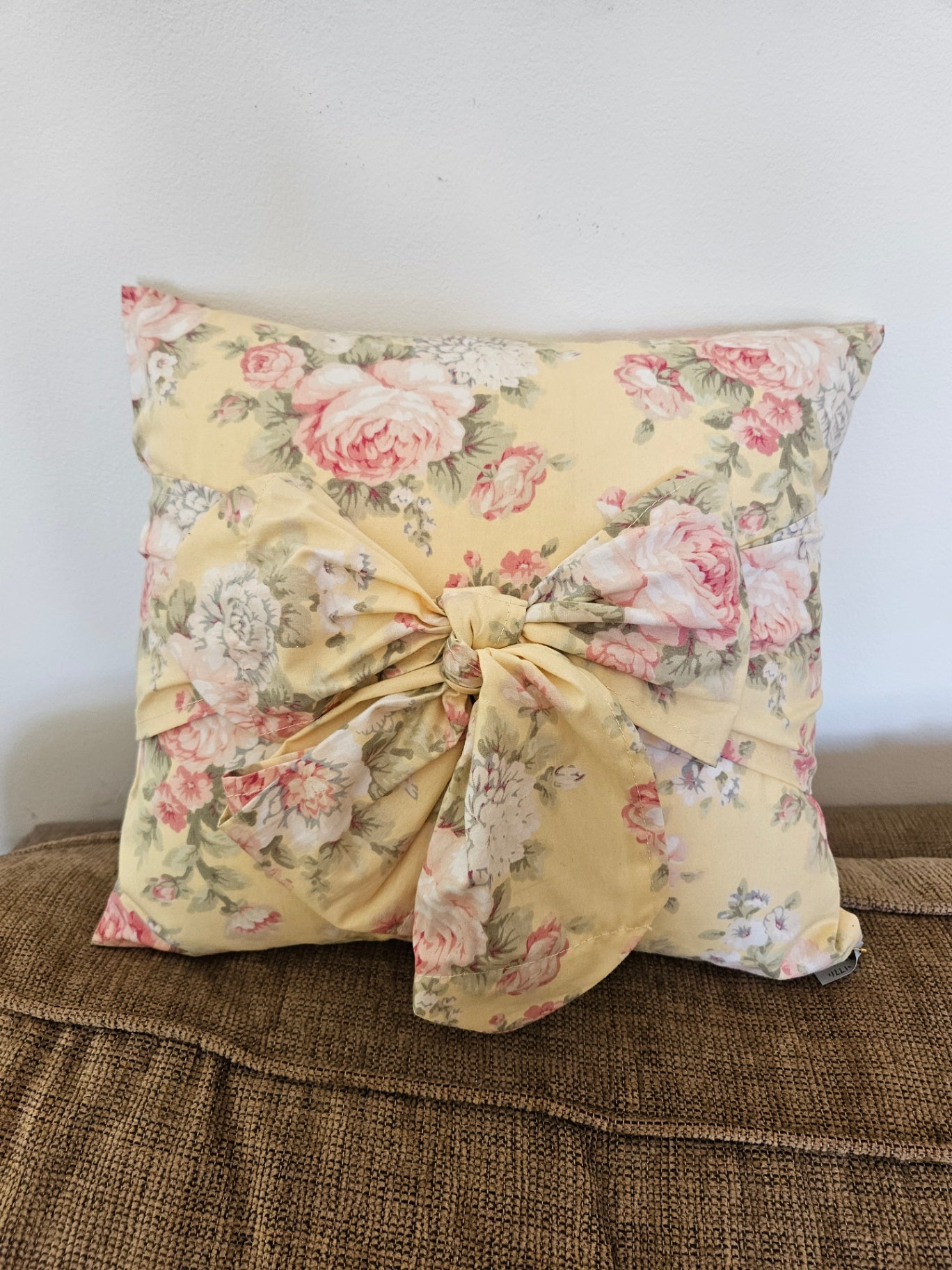 Yellow floral pillow /bow