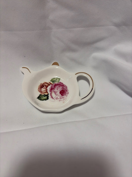 Teapot shaped teabag holder with roses