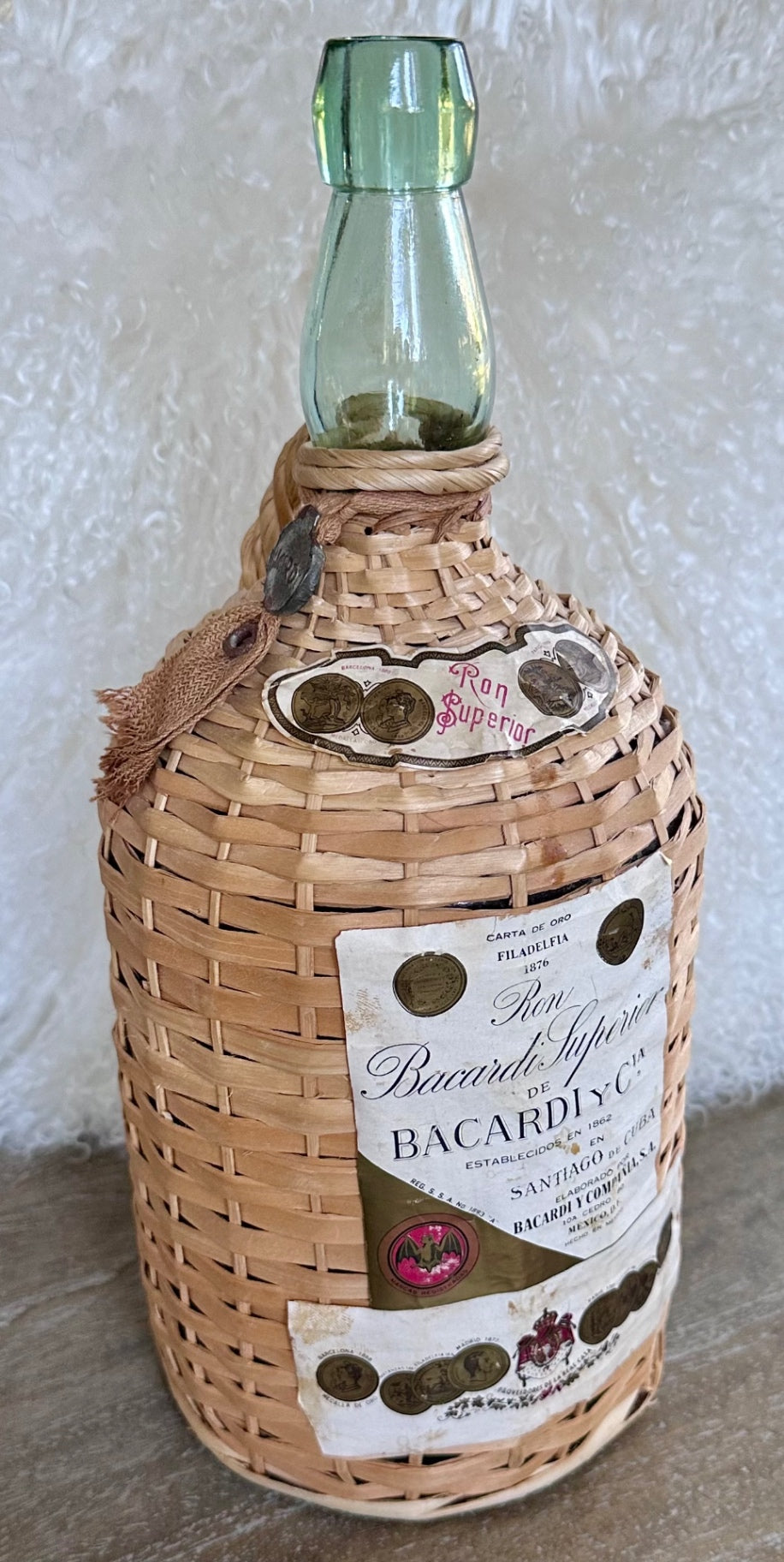 Vintage wicker wrapped Bacardi Demijohn bottle
