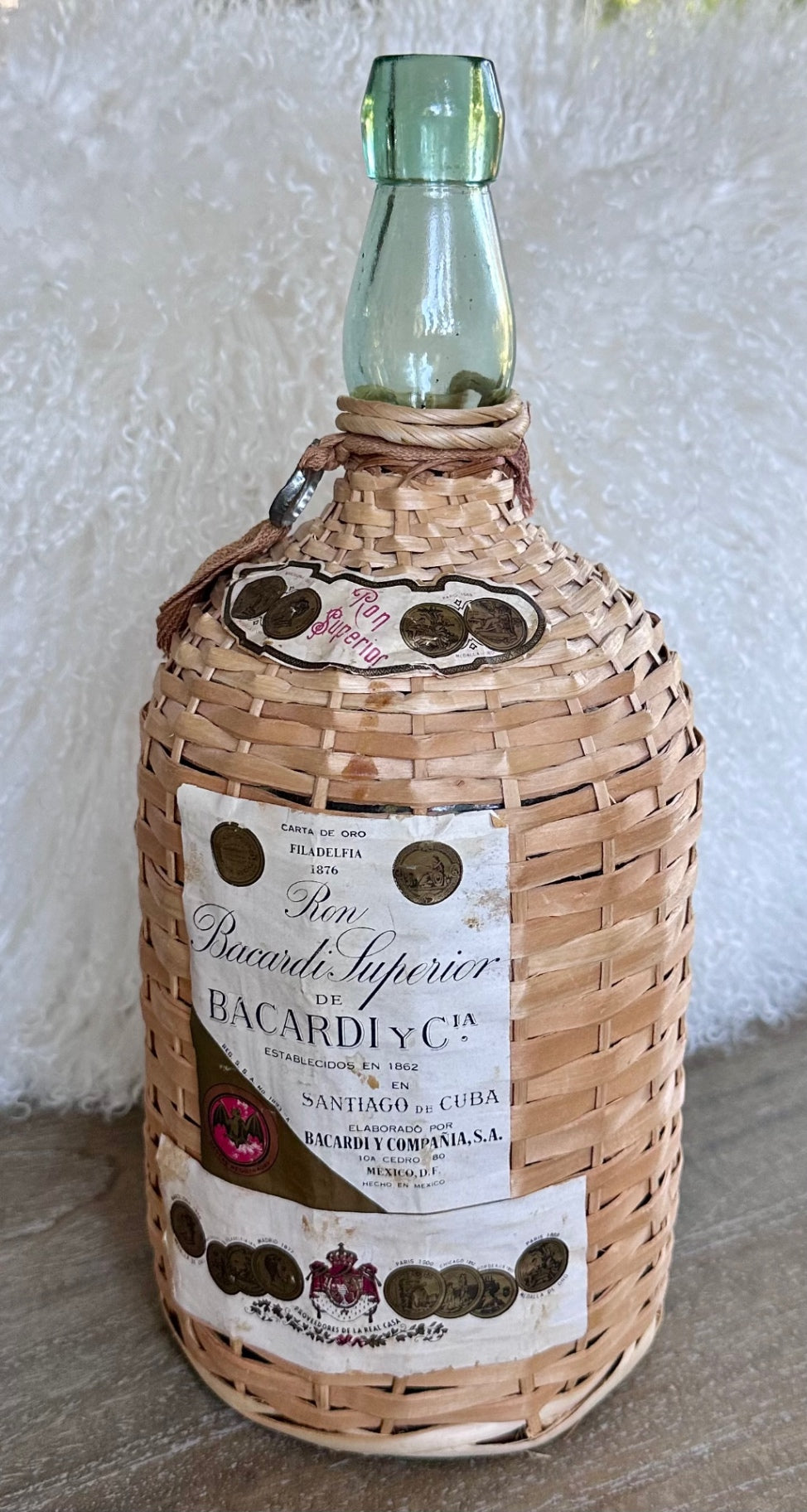 Vintage wicker wrapped Bacardi Demijohn bottle