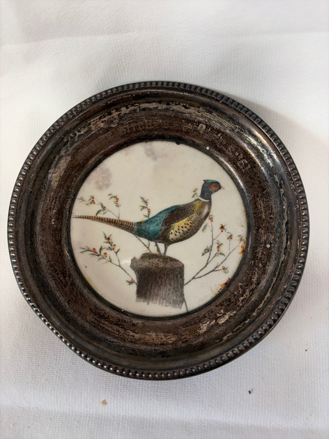 ~4” Sterling Silver and porcelain coaster