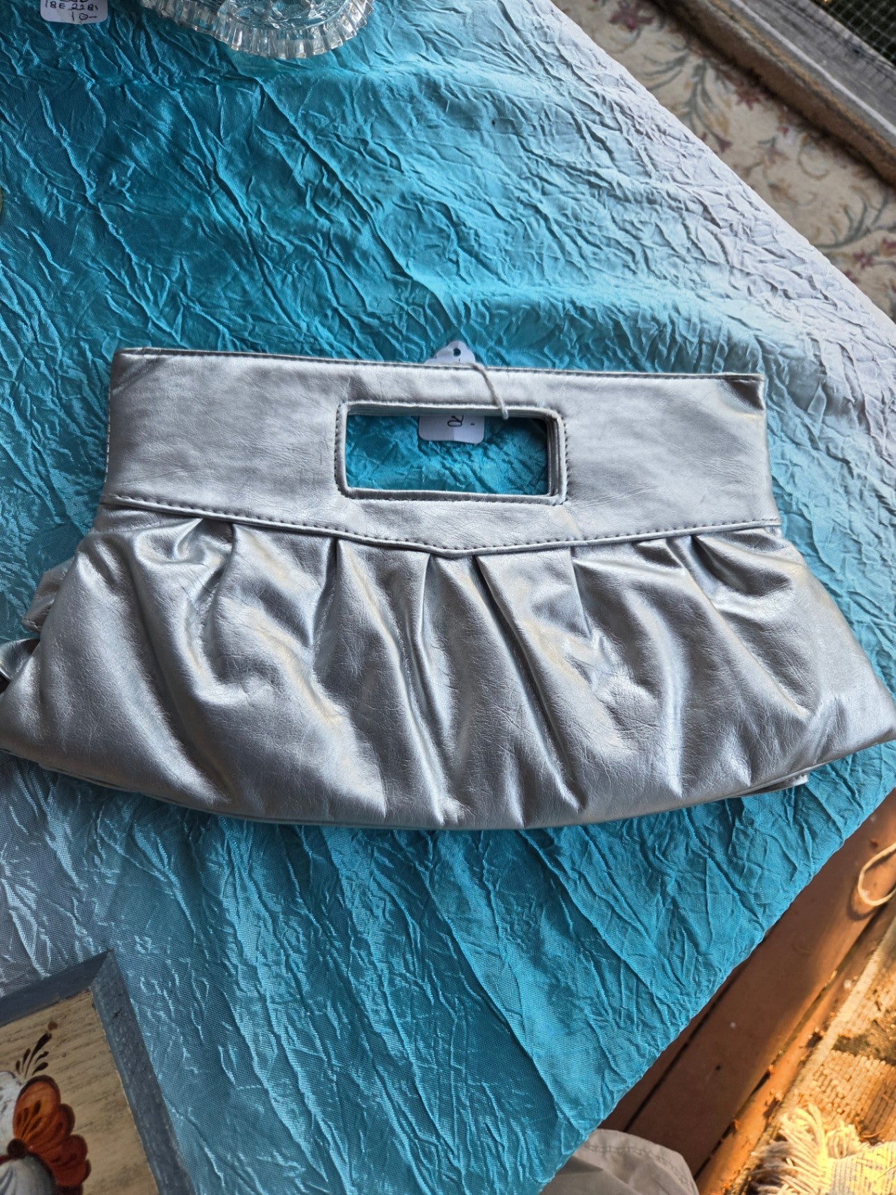 Silver clutch