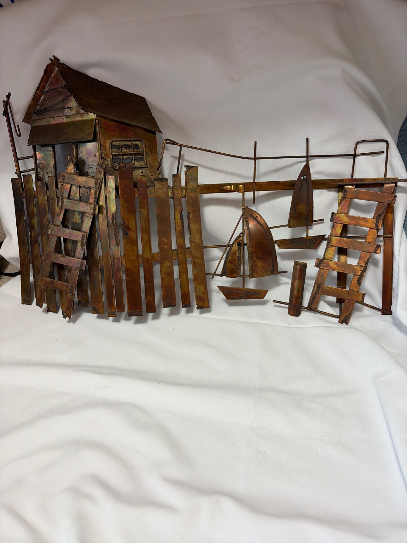 Metal wall hanging sculpture 