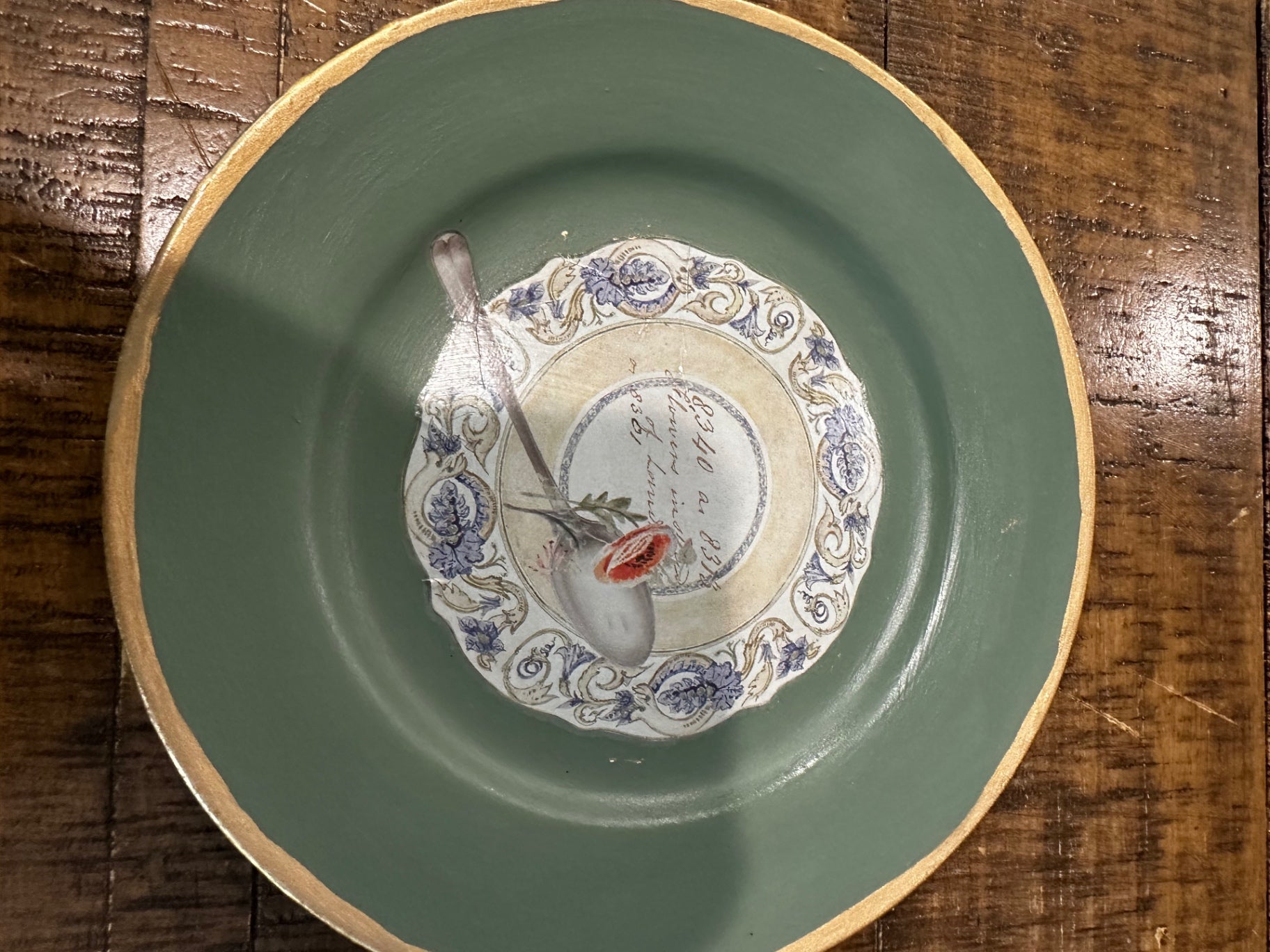 Green plate with tea cup