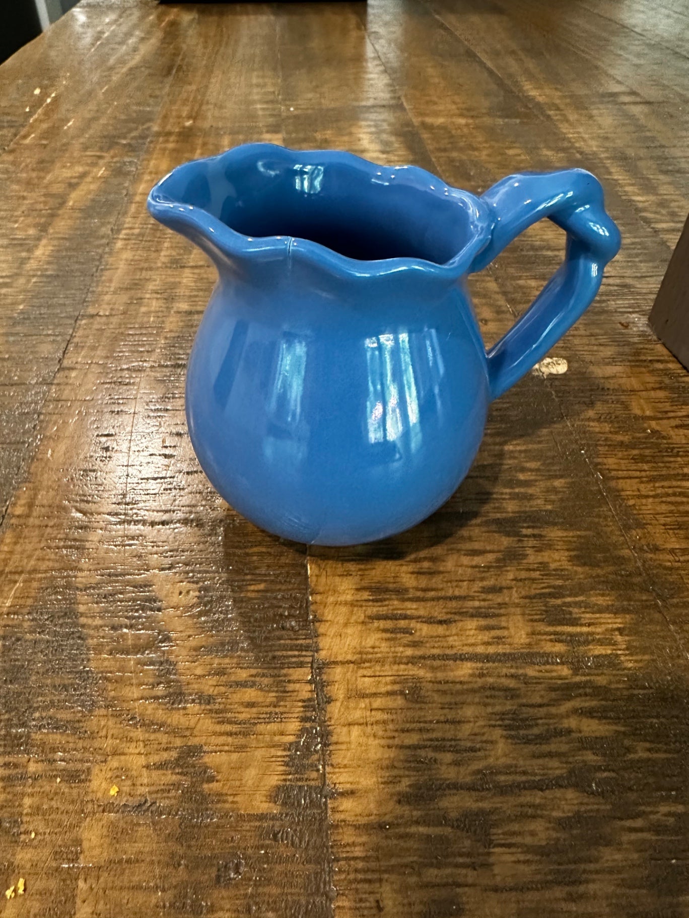 Small blue pitcher