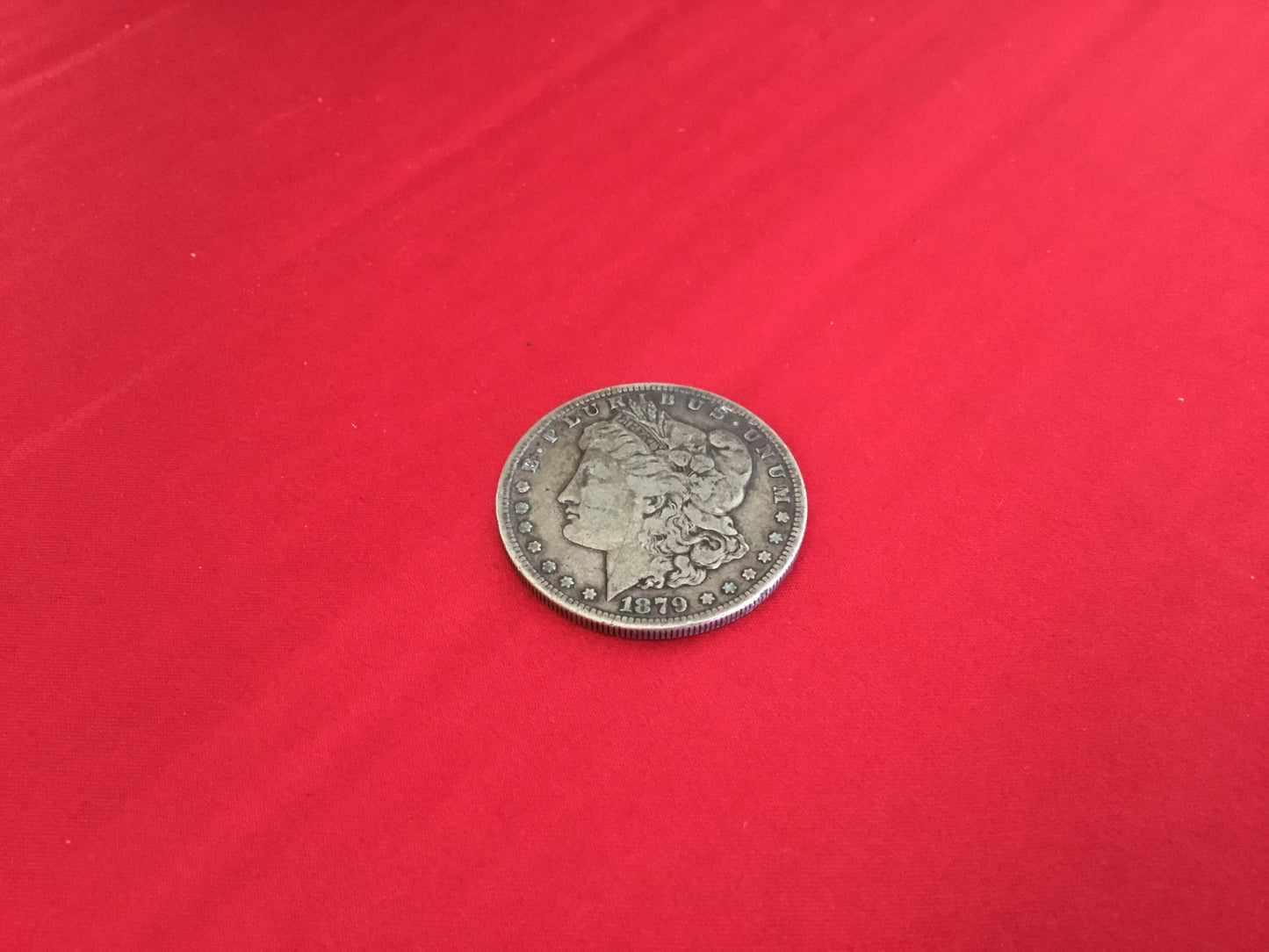 1879 Morgan silver dollar