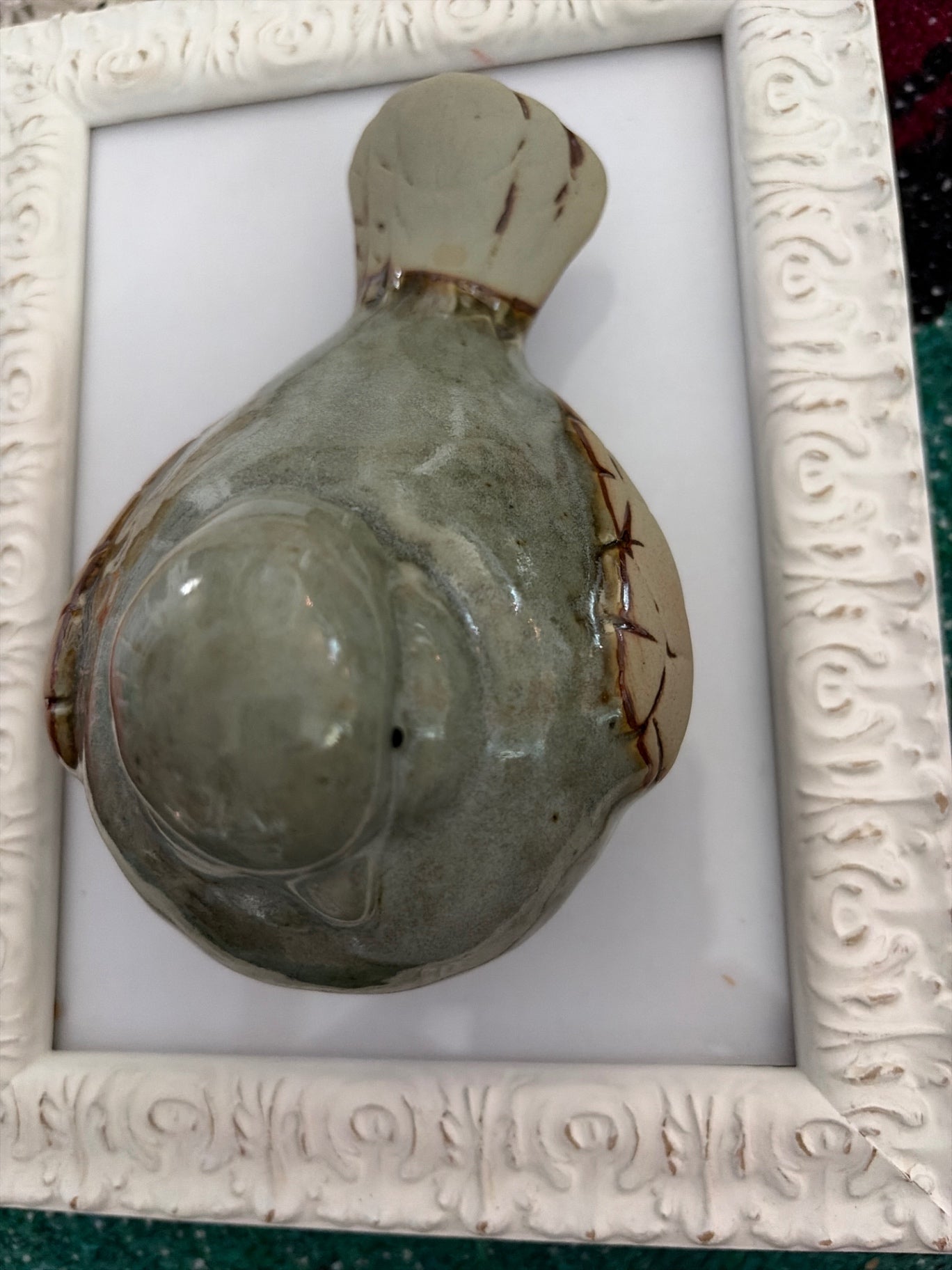 Ceramic bird.