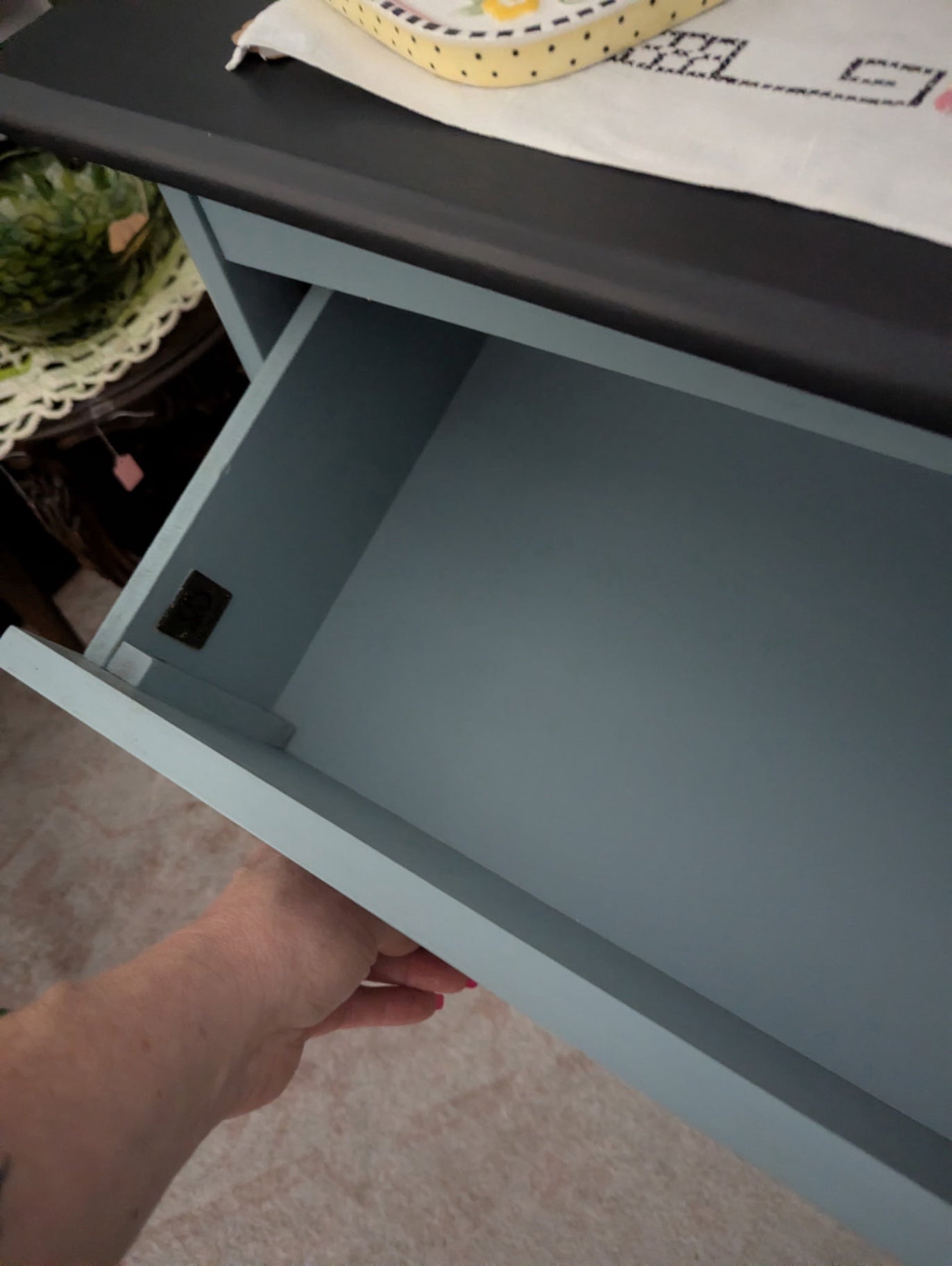 Newer wood and composite dresser painted beautifully blue w/black top