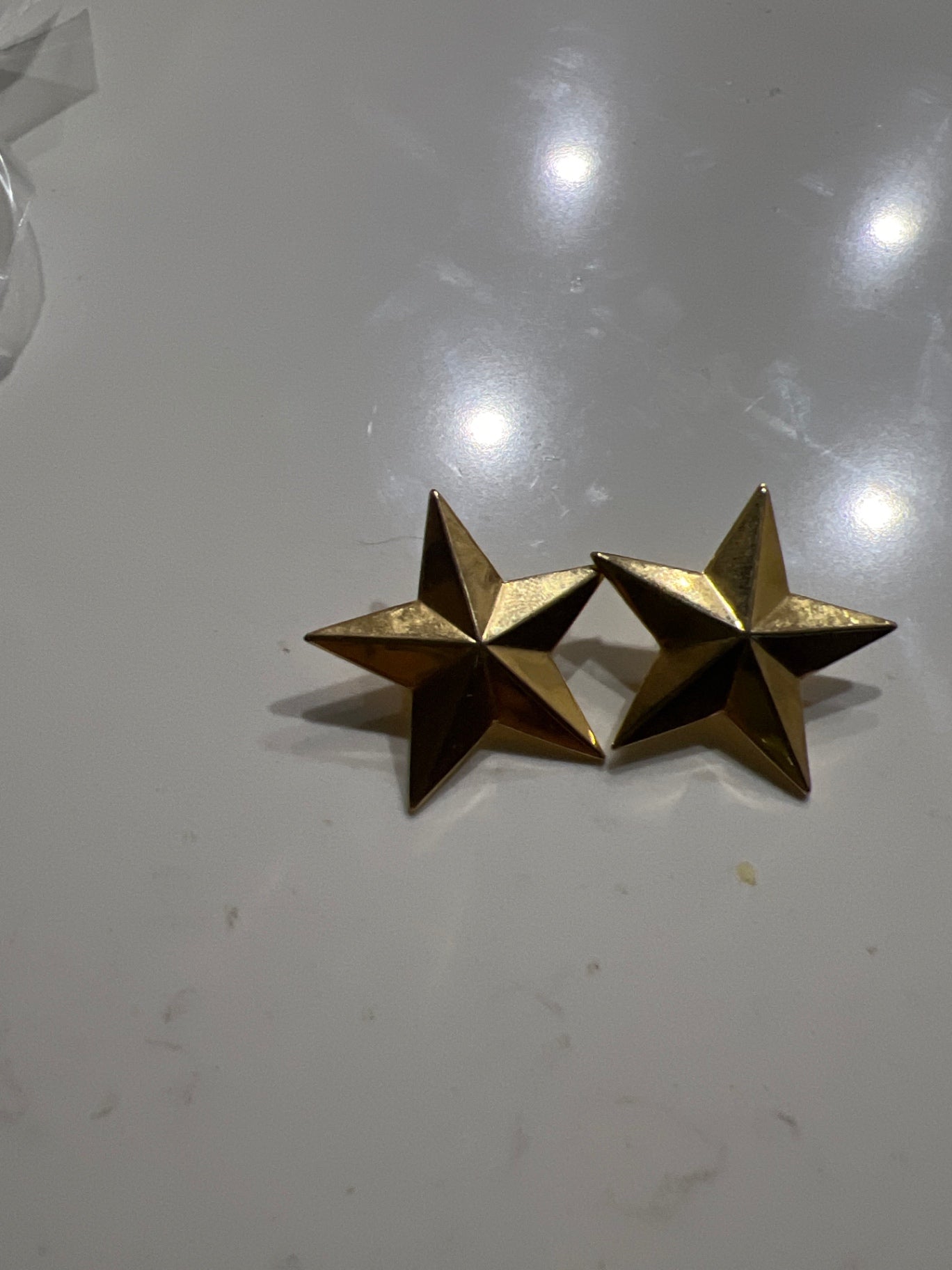 Gold star earrings 