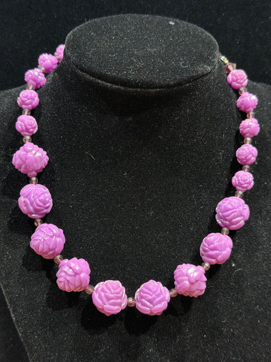 Purple plastic rosette necklace 16”