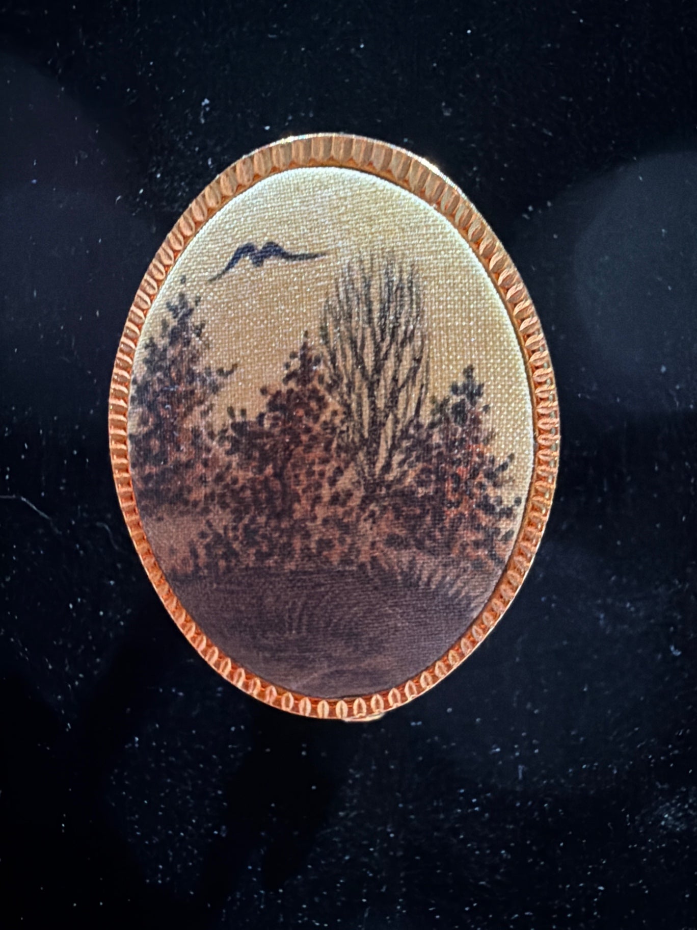 Painted landscape brooch