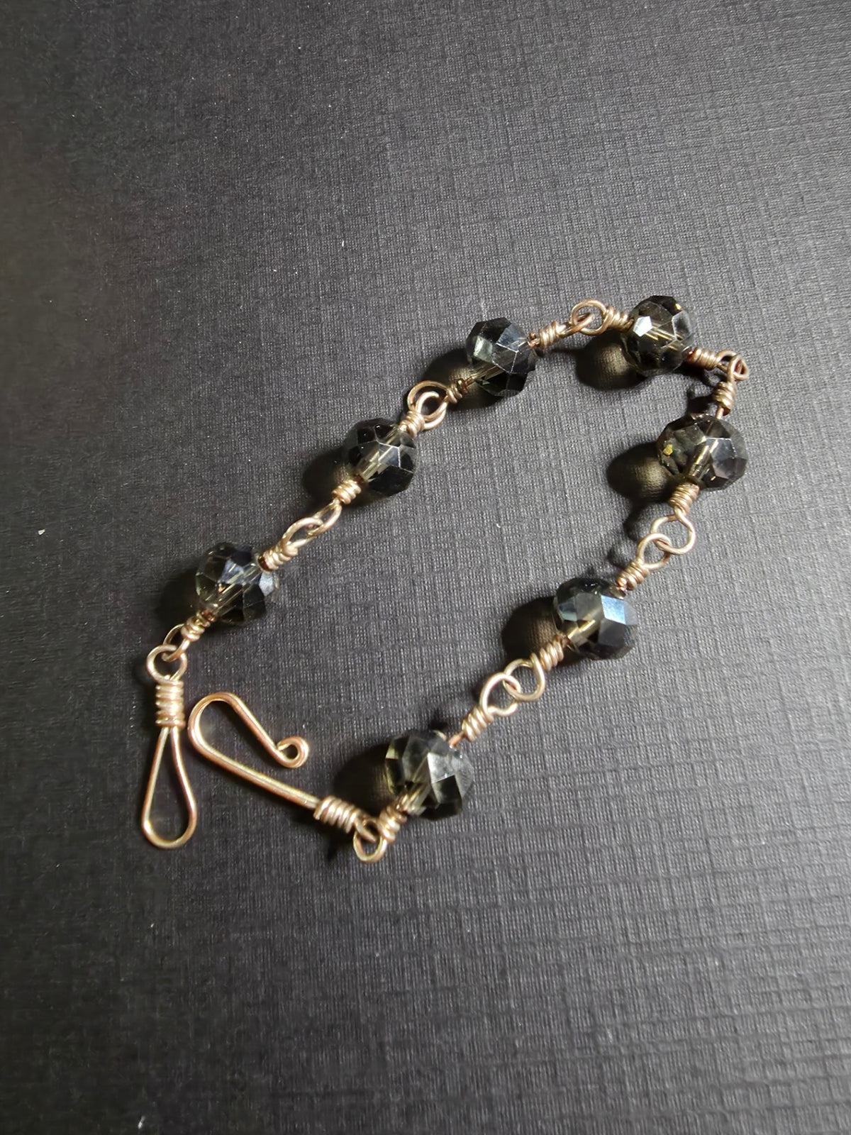 17B wire wrapped ss w/black crystals 