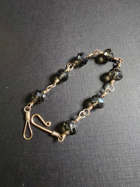 17B wire wrapped ss w/black crystals 