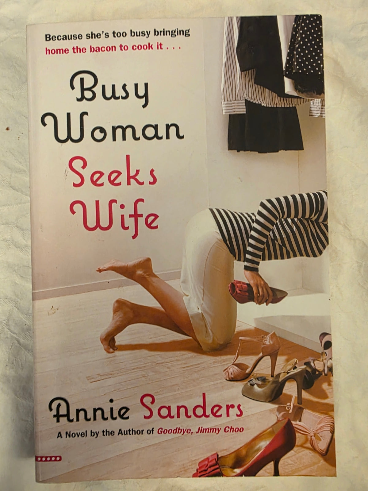 BUSY WOMAN SEEKS WIFE.