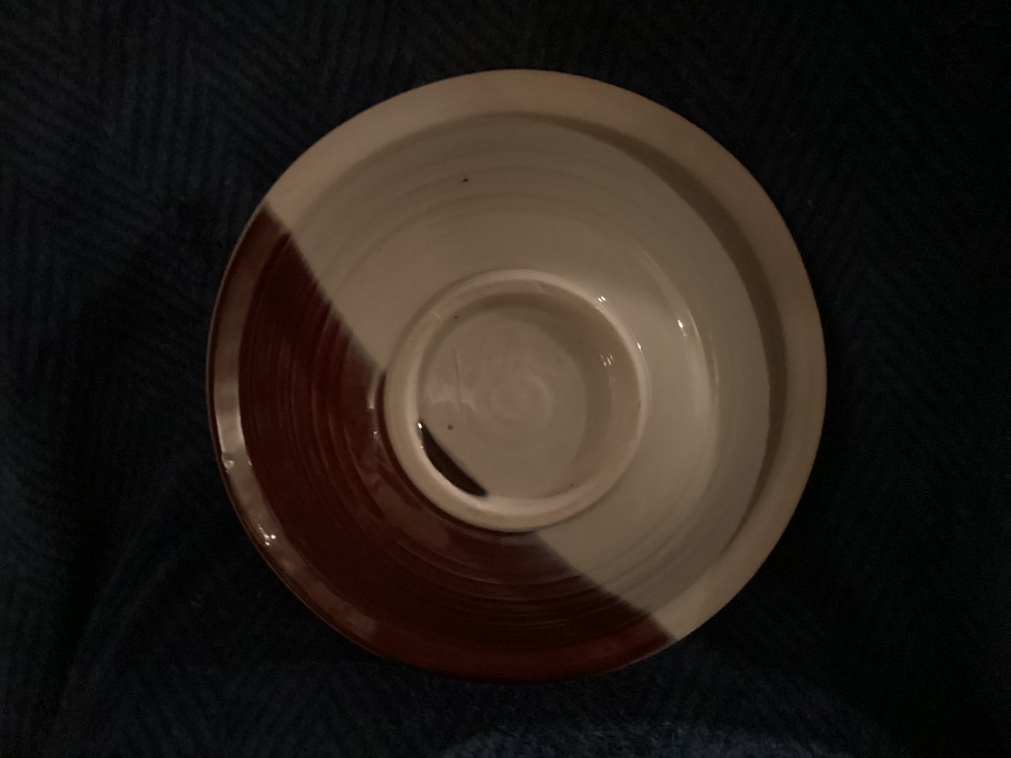 Signed pottery large serving bowl on footed base