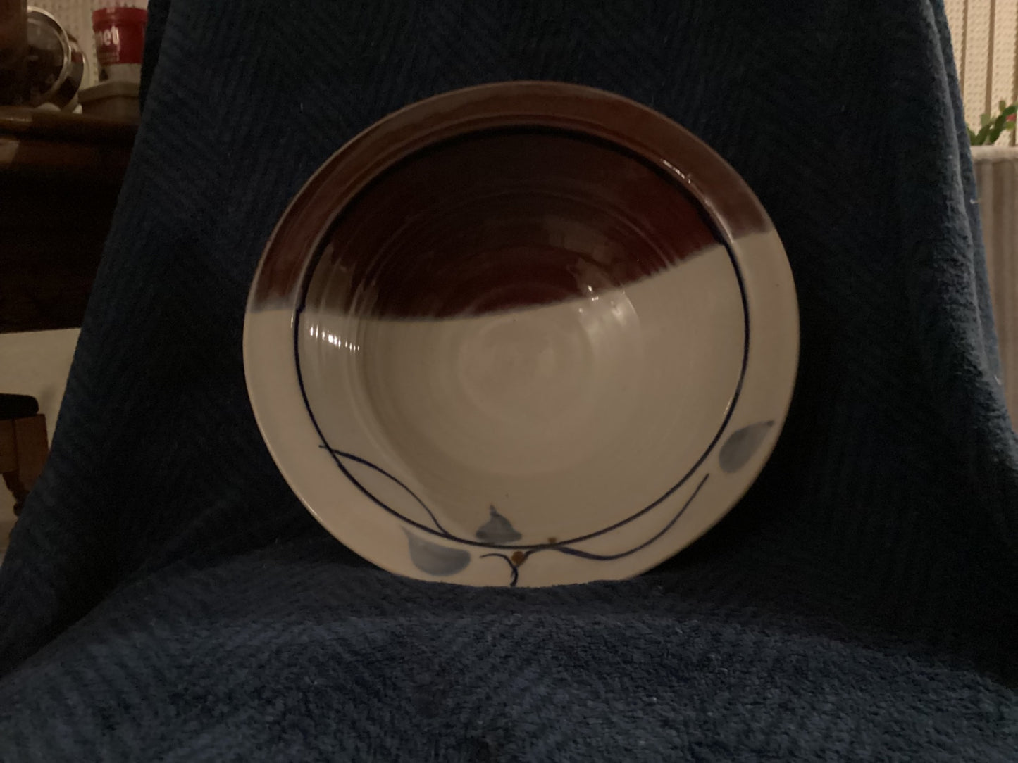 Signed pottery large serving bowl on footed base