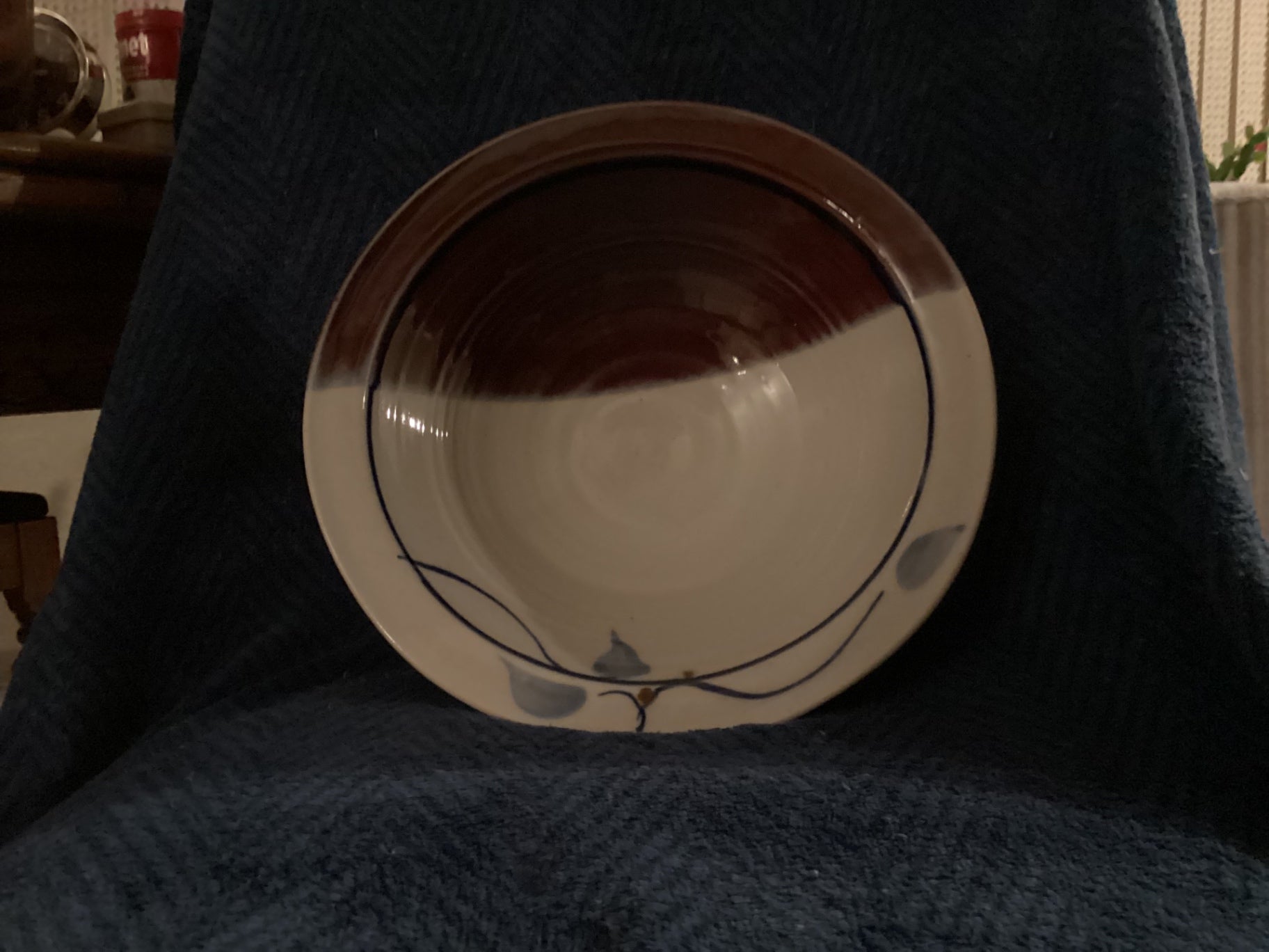 Signed pottery large serving bowl on footed base
