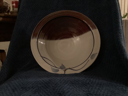 Signed pottery large serving bowl on footed base