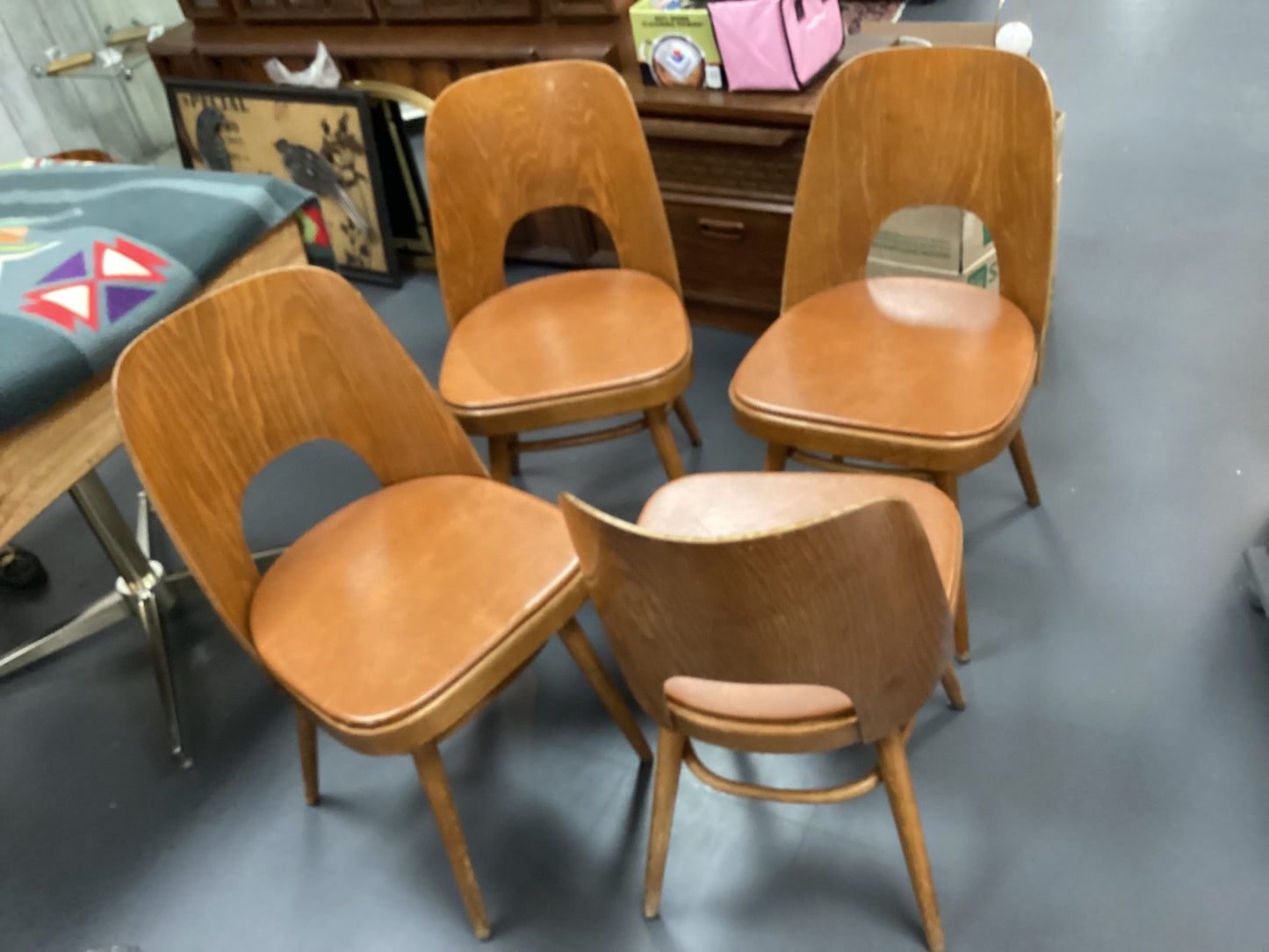 Four Bentwood back chairs stamped and numbered