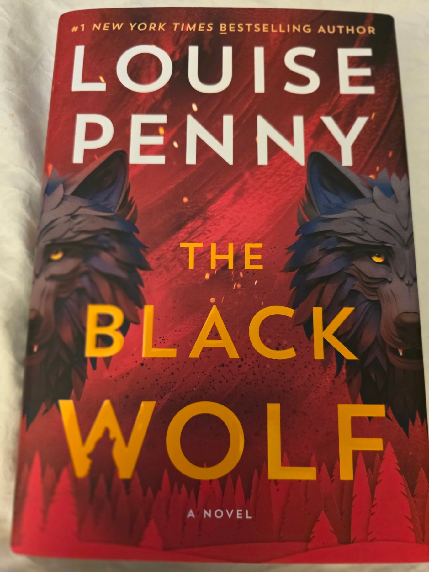 THE BLACK WOLF by Louise Penny.