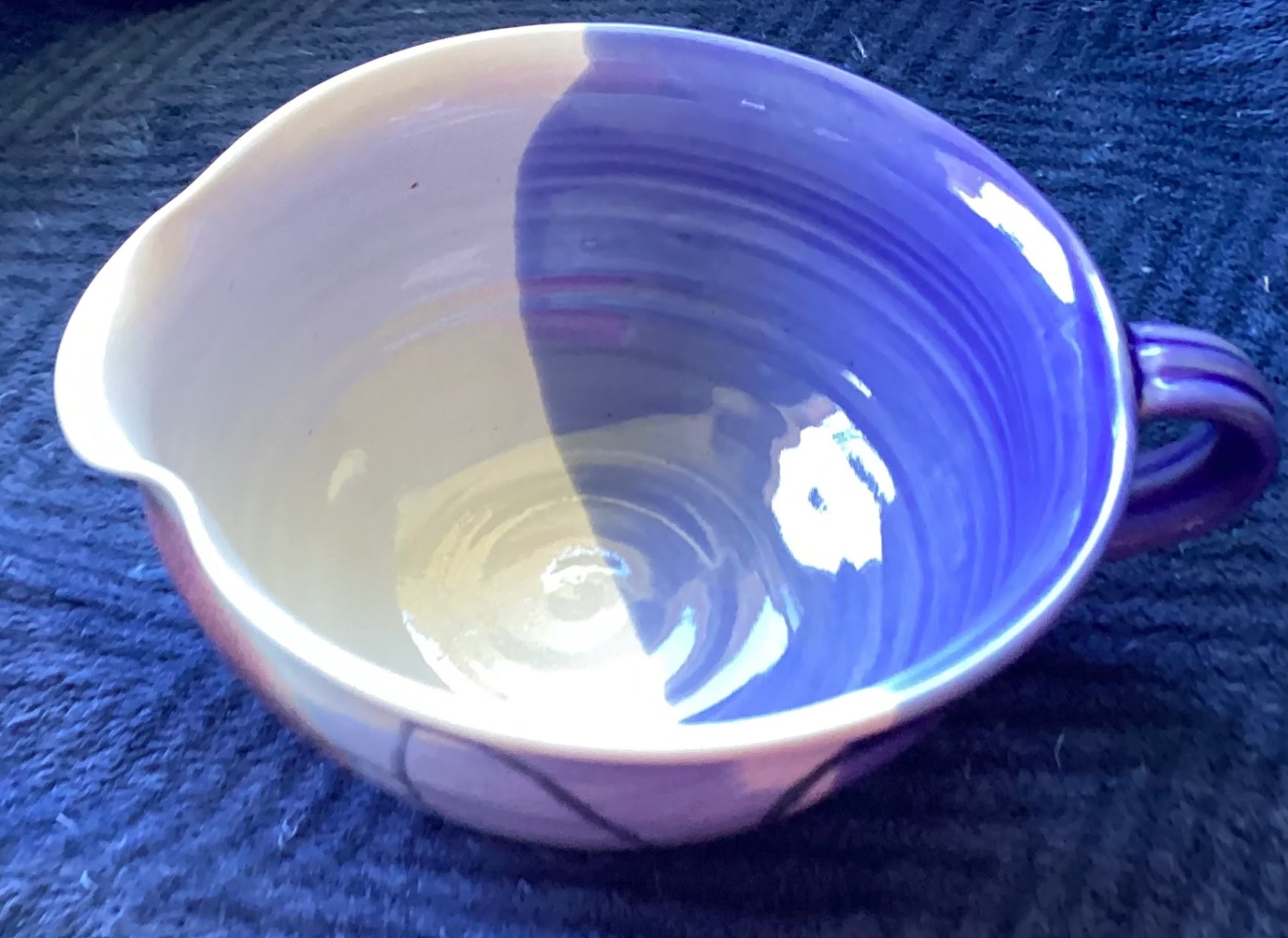 Signed pottery pitcher 