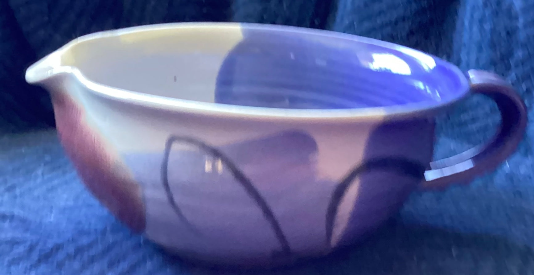 Signed pottery pitcher 