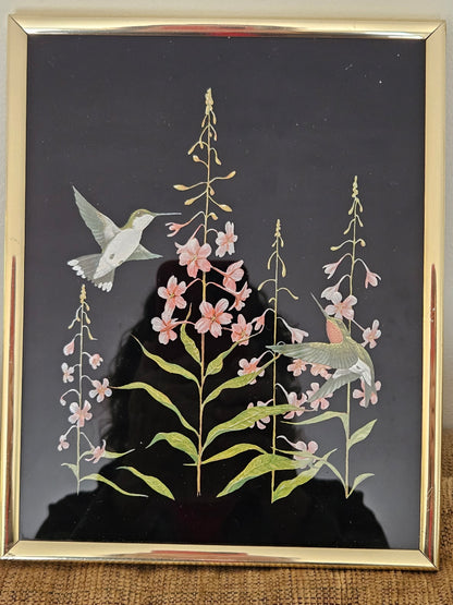 Kafka screened etching hummingbird on black background