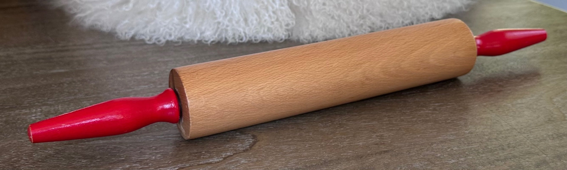 Vintage red handled rolling pin