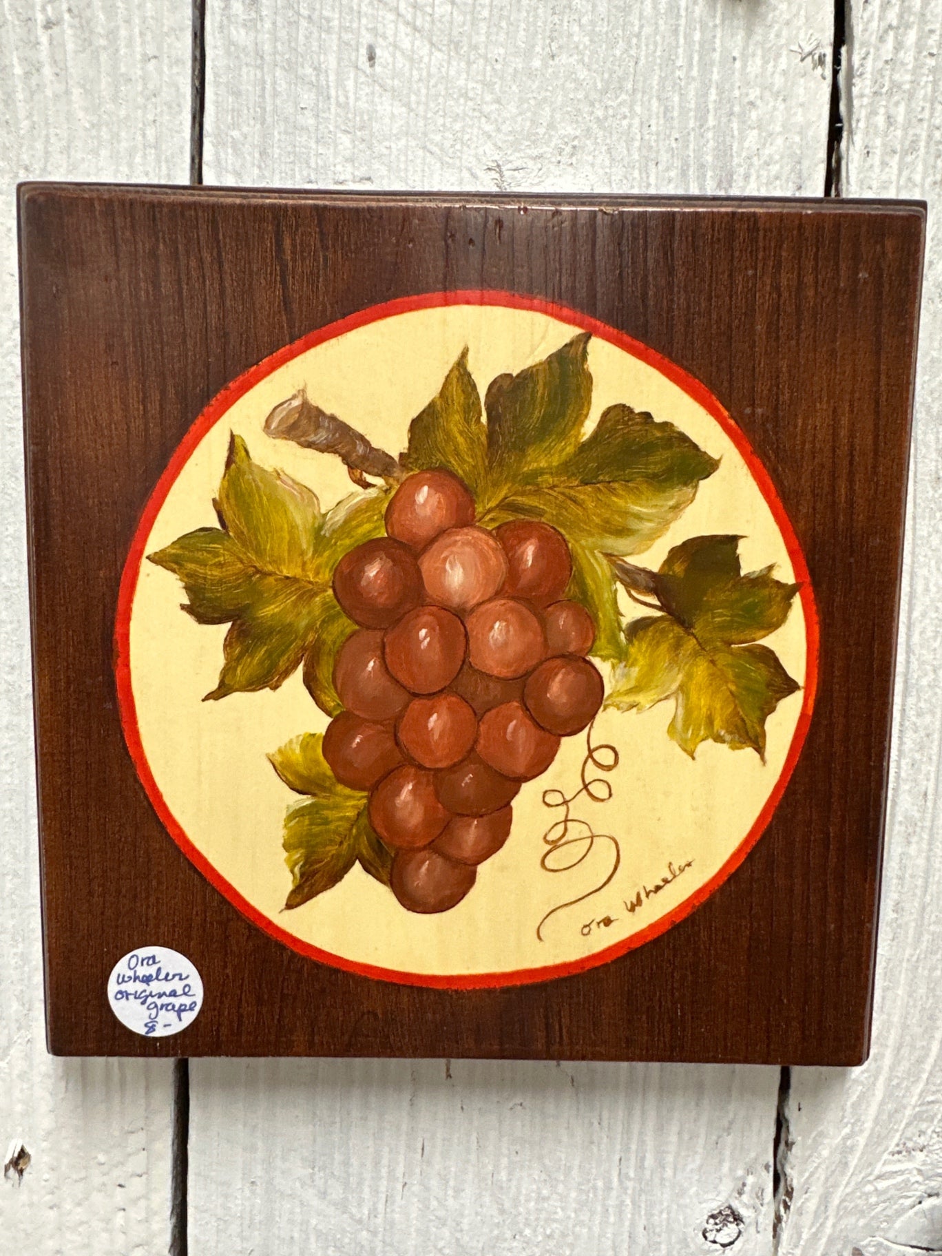 Variety of hand painted fruit on wood, signed by artist