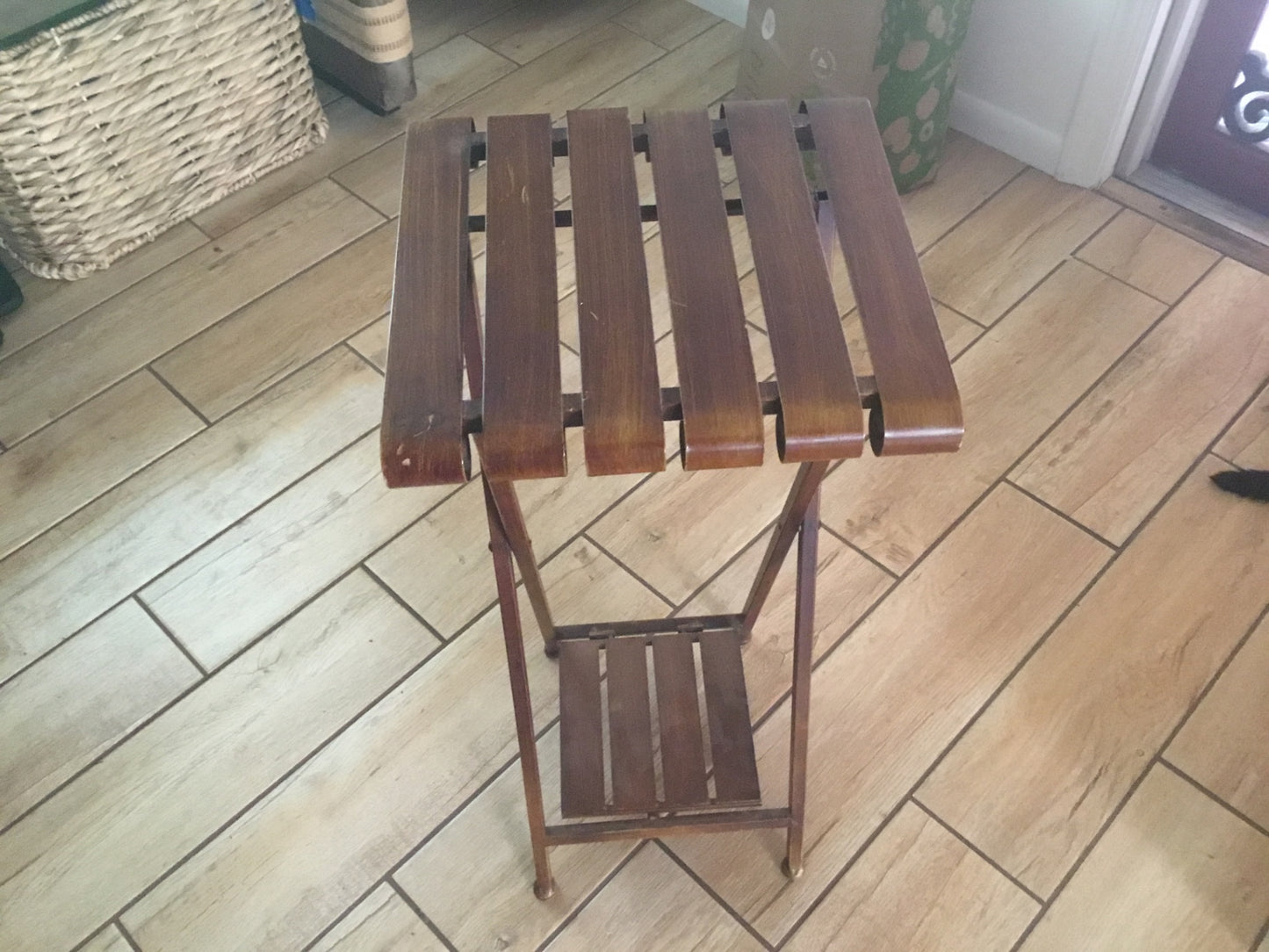 Collapsible, metal two tiered stand